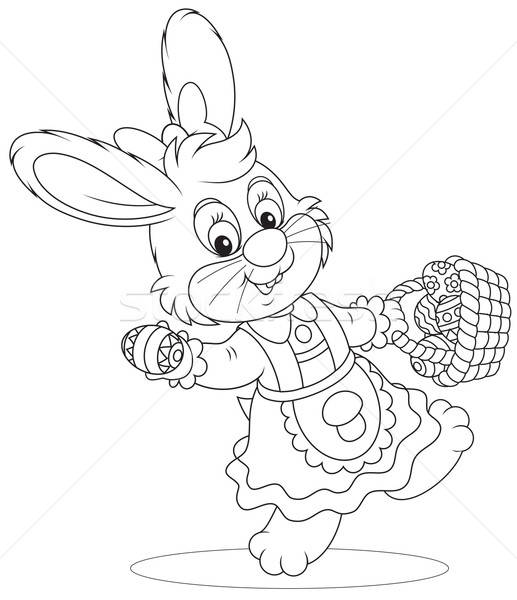 Easter Bunny with a basket of eggs Stock photo © AlexBannykh