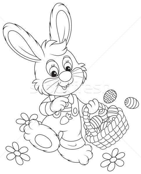 Easter Bunny with a basket of eggs Stock photo © AlexBannykh