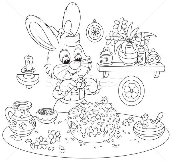 Bunny cooks a holiday cake to Easter Stock photo © AlexBannykh