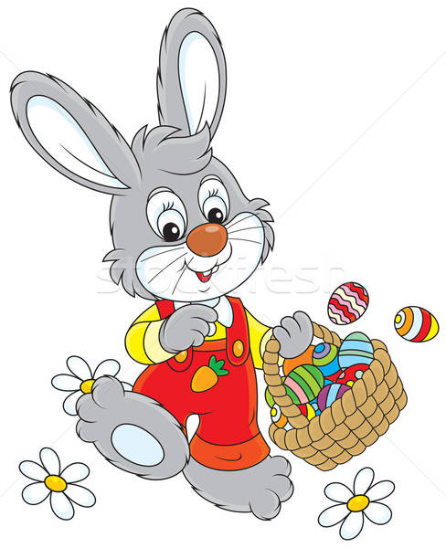 Easter Bunny with a basket of eggs Stock photo © AlexBannykh