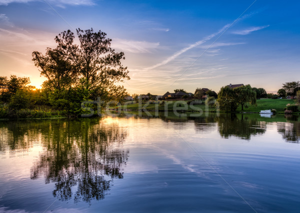 Sunset on the lake Stock photo © alexeys