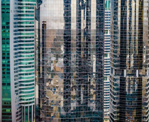 Wolkenkratzer Fenster Gebäude Dubai Gebäude Stadt Stock foto © alexeys
