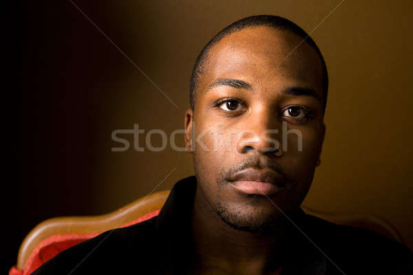Bonito homem negro retrato jovem escuro fundo Foto stock © alexeys