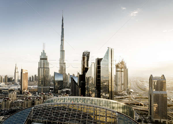 Dubai centro da cidade linha do horizonte ver pôr do sol céu Foto stock © alexeys