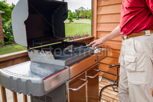 Cleaning grill Stock photo © alexeys