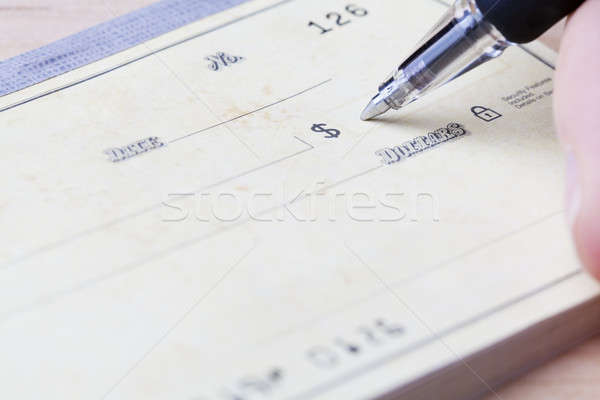 Schrijven controleren hand vulling uit Stockfoto © alexeys