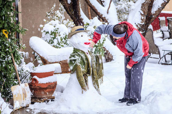 Készít hóember nő előkert hóvihar ház Stock fotó © alexeys