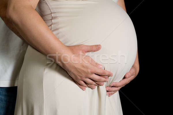 Várakozás pár kéz a kézben gyomor várandós anya család Stock fotó © alexeys