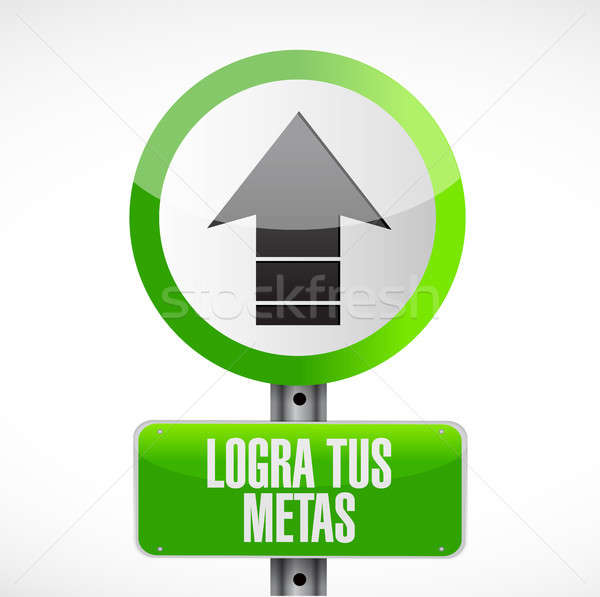 achieve your goals road sign in Spanish. Stock photo © alexmillos