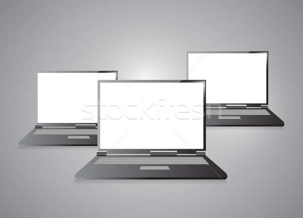Laptops with blank screen isolated on grey Stock photo © alexmillos
