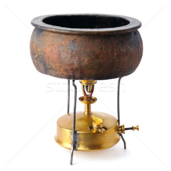 kerosene stove and a ceramic pot isolated on white background Stock photo © alinamd