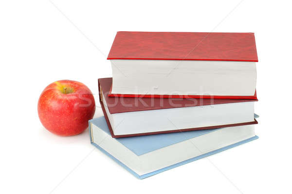 Stock photo: books and apple isolated on white background