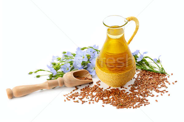 seeds, flax oil and flowers isolated on white background Stock photo © alinamd
