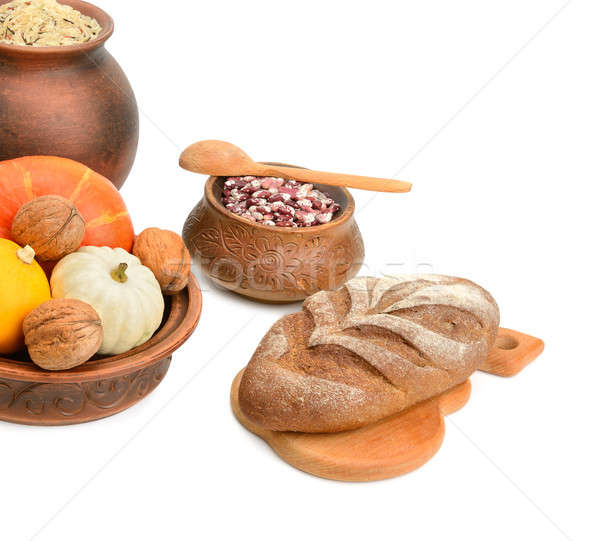 food in a ceramic pot isolated on white background Stock photo © alinamd