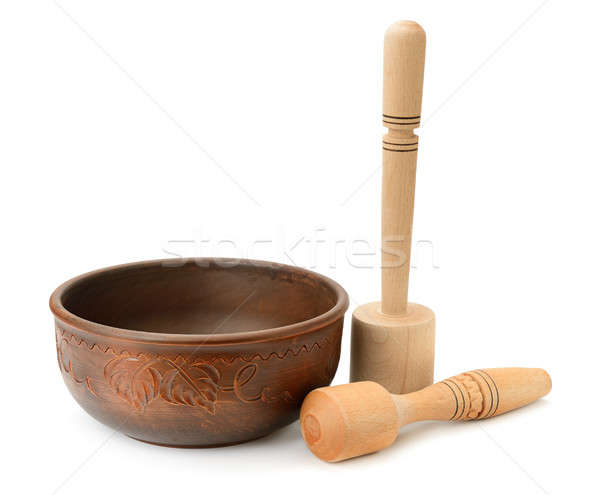 earthenware dish and wooden pestle isolated on white background Stock photo © alinamd