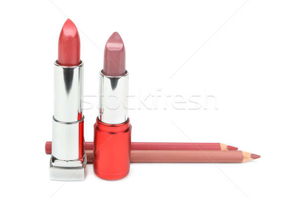 lipsticks and cosmetic pencils isolated on a white background Stock photo © alinamd