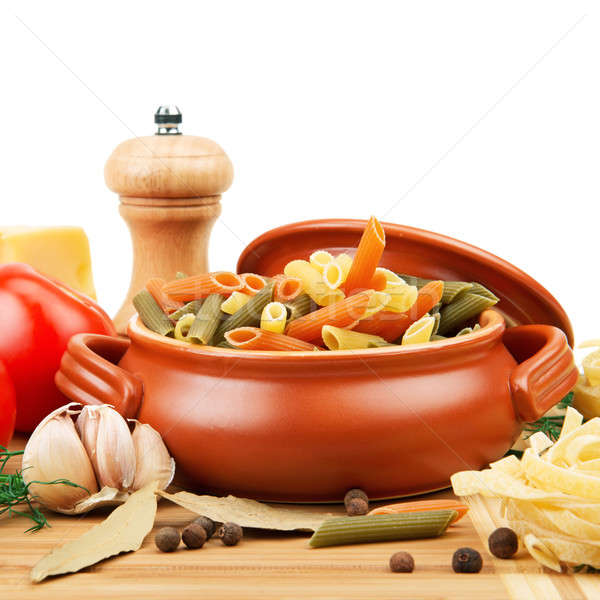 pasta and spices in a ceramic pot Stock photo © alinamd