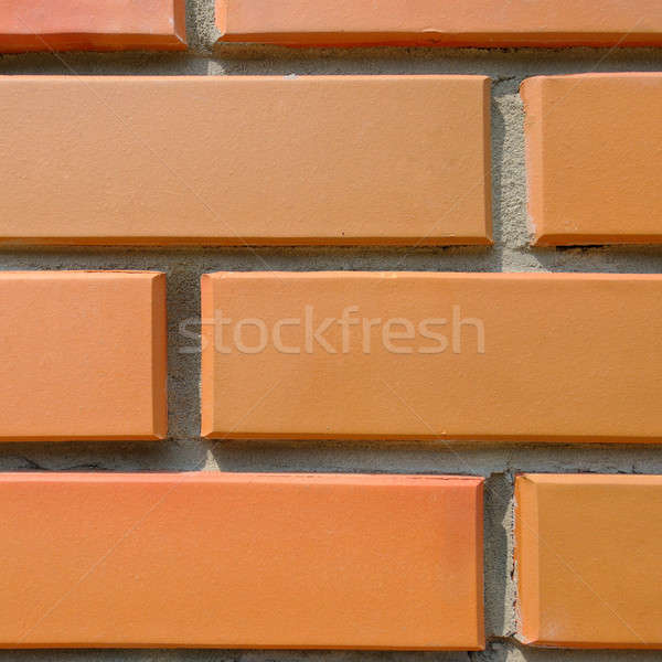 Detail of the house wall. Background of facing bricks Stock photo © alinamd