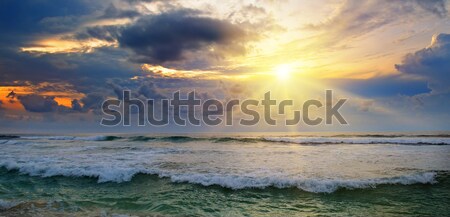 [[stock_photo]]: Océan · coucher · du · soleil · sombre · ciel · eau · nuages