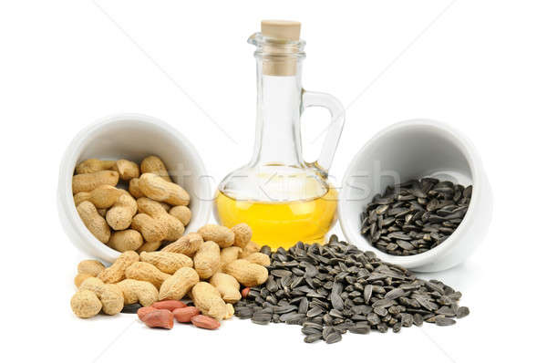 Sunflower seeds, peanuts and oil Stock photo © alinamd
