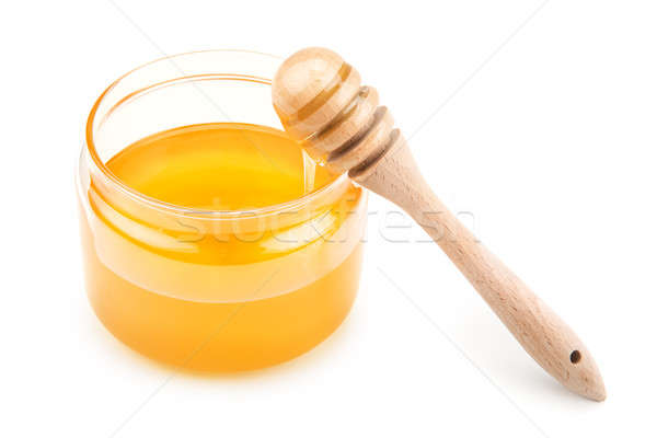 pot with honey and drizzler Stock photo © alinamd