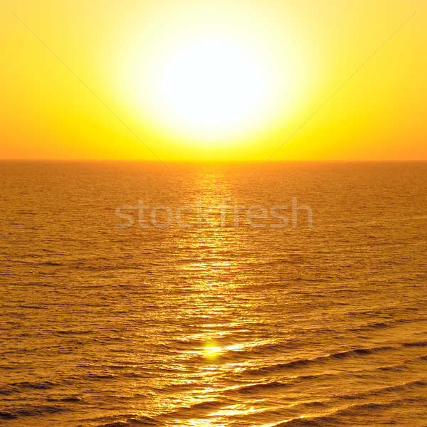 Fantástico nascer do sol oceano água primavera sol Foto stock © alinamd