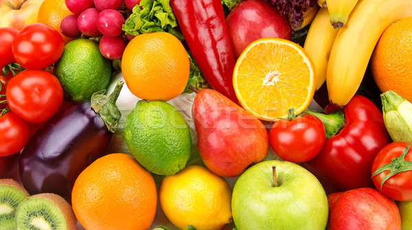 Stock photo: bright background of ripe fruits  and vegetables