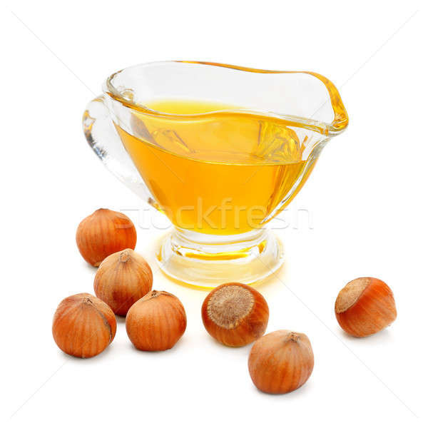 Oil and fruit hazelnut isolated on white . Stock photo © alinamd