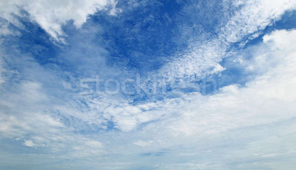 The white cumulus clouds against the blue sky Stock photo © alinamd