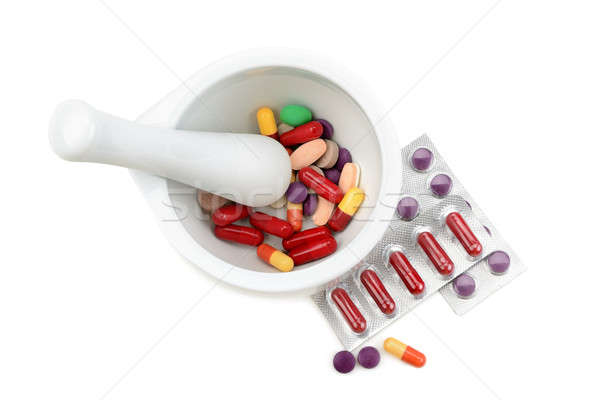 pills in a mortar isolated on white background Stock photo © alinamd