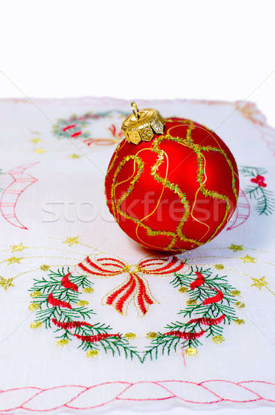 Red Christmas ball embroidered napkin isolated Stock photo © AlisLuch
