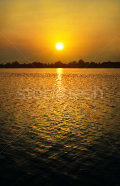 Tramonto lago panorama riflessione luce superficie Foto d'archivio © AlisLuch