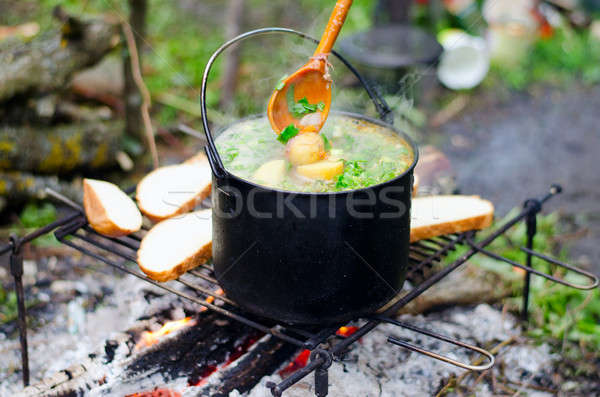 Cottura zuppa fuoco preparazione patate pot Foto d'archivio © AlisLuch