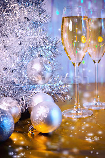 Stock photo: Christmas tree, toy balloons and glasses of wine