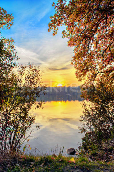 Autunno tramonto lago riflessione sole acqua Foto d'archivio © AlisLuch