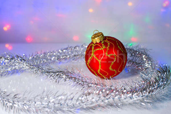 Red Christmas-tree ball and tinsel Stock photo © AlisLuch