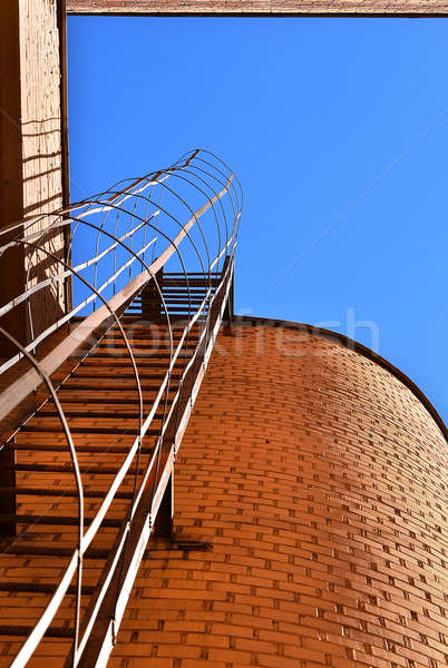 Industriali scala cielo blu mattone muri costruzione Foto d'archivio © AlisLuch