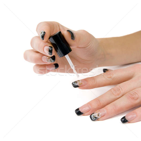 Manicure. The process of lacquer on the nails. Stock photo © All32