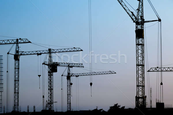 Sylwetki budowy pracy wygaśnięcia przestrzeni niebieski Zdjęcia stock © All32