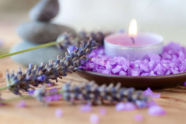 Candle in a saucer with salt baths and sprigs of lavender Stock photo © All32