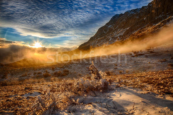 Winter landschap mist berg licht zonsondergang Stockfoto © All32