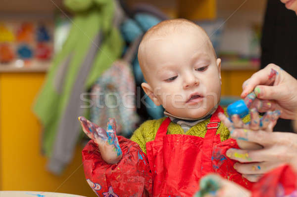 The child draws a finger paints Stock photo © All32