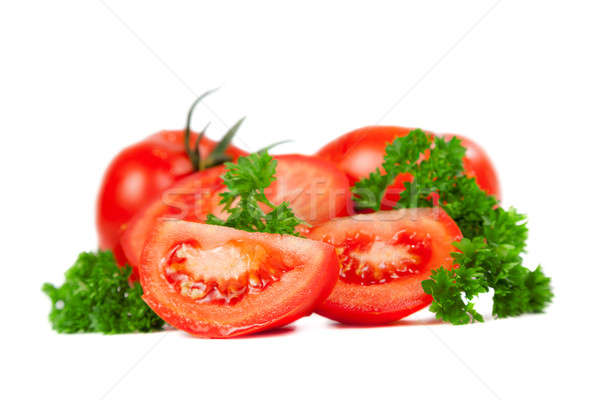 Cięcia pomidory plastry pietruszka pozostawia odizolowany Zdjęcia stock © All32