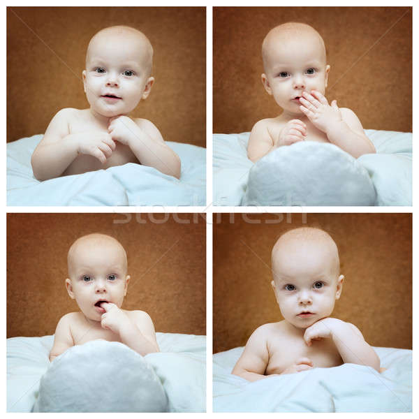 Stock photo: Little boy sitting in a pillow