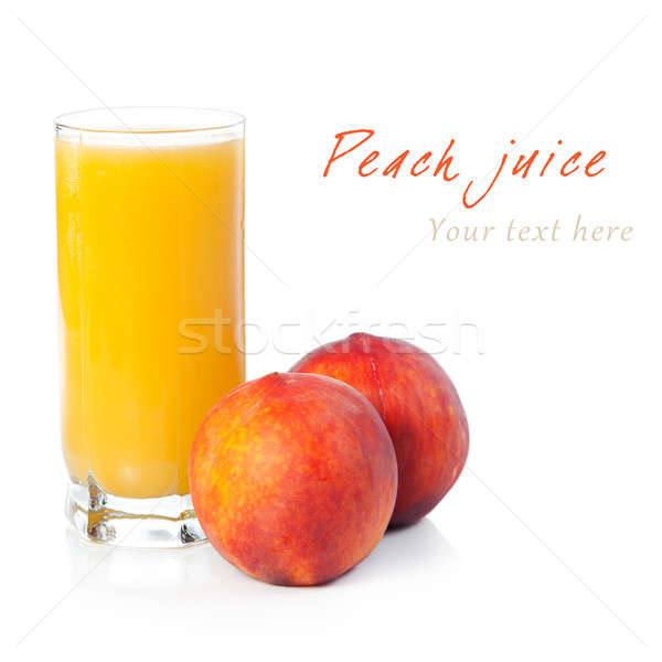 A glass of peach juice with fruits near Stock photo © All32