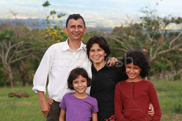 Ispanico famiglia felice quattro sorriso bambino Foto d'archivio © allihays