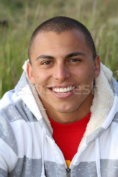 Sorridere uomo attrattivo giovani ispanico outdoor Foto d'archivio © allihays