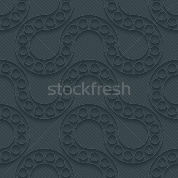 Stock photo: Dark perforated paper.