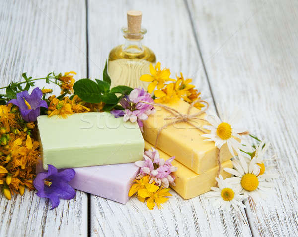 Stock photo: herbal  treatment - camomile, tutsan and soap