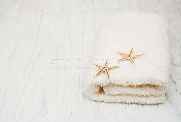 Katoen bad handdoek zeester oude houten Stockfoto © almaje